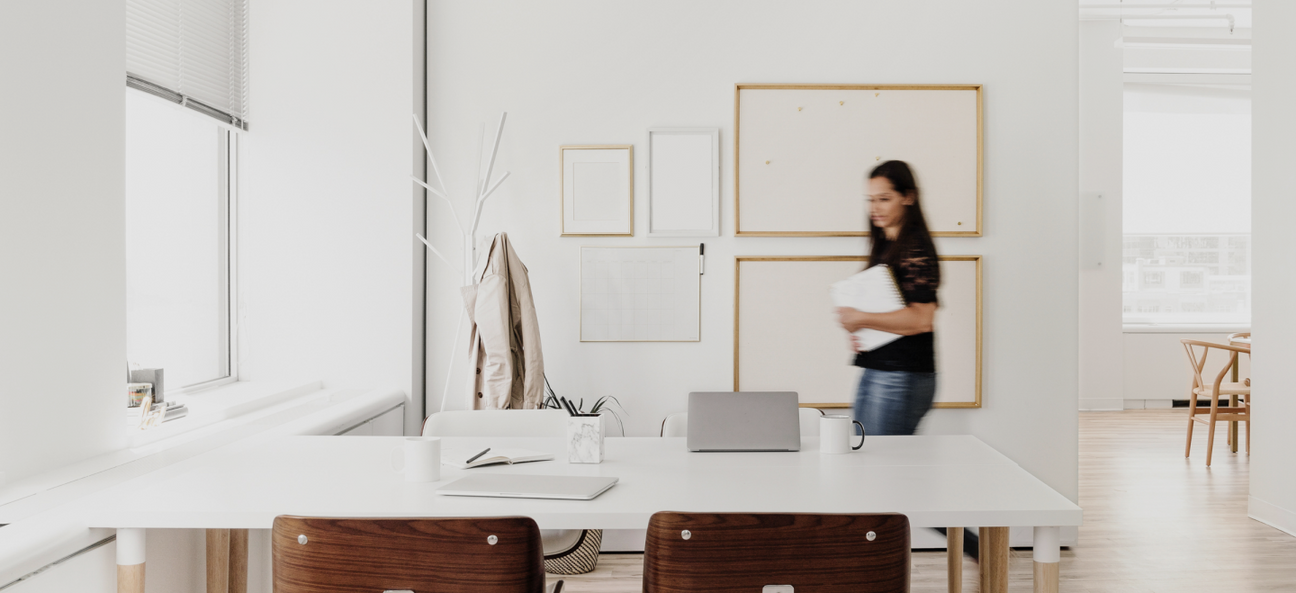 a woman walking in a room