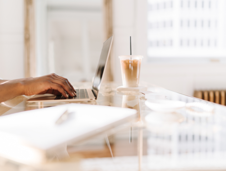 a person using a laptop on a table